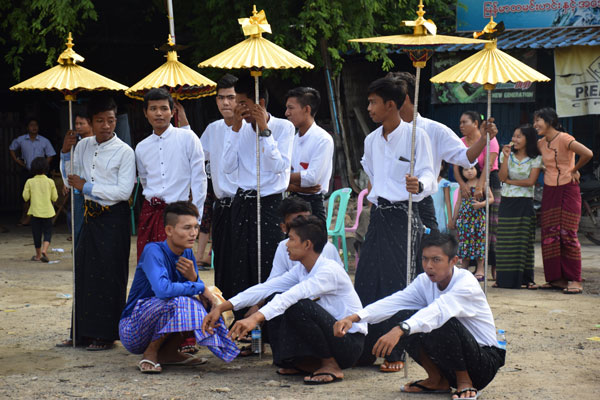Myanmar men with traditional longyi 